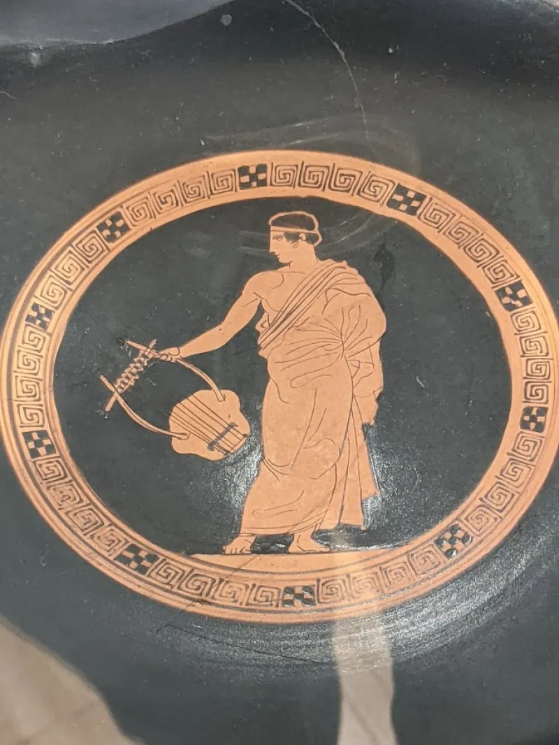 Tondo From An Attic Red-Figure Kylix Attributed To Aison, Dating 450 – 400 Bce, Depicting A Young Man Holding A Lyre, Eskenazi Museum Of 