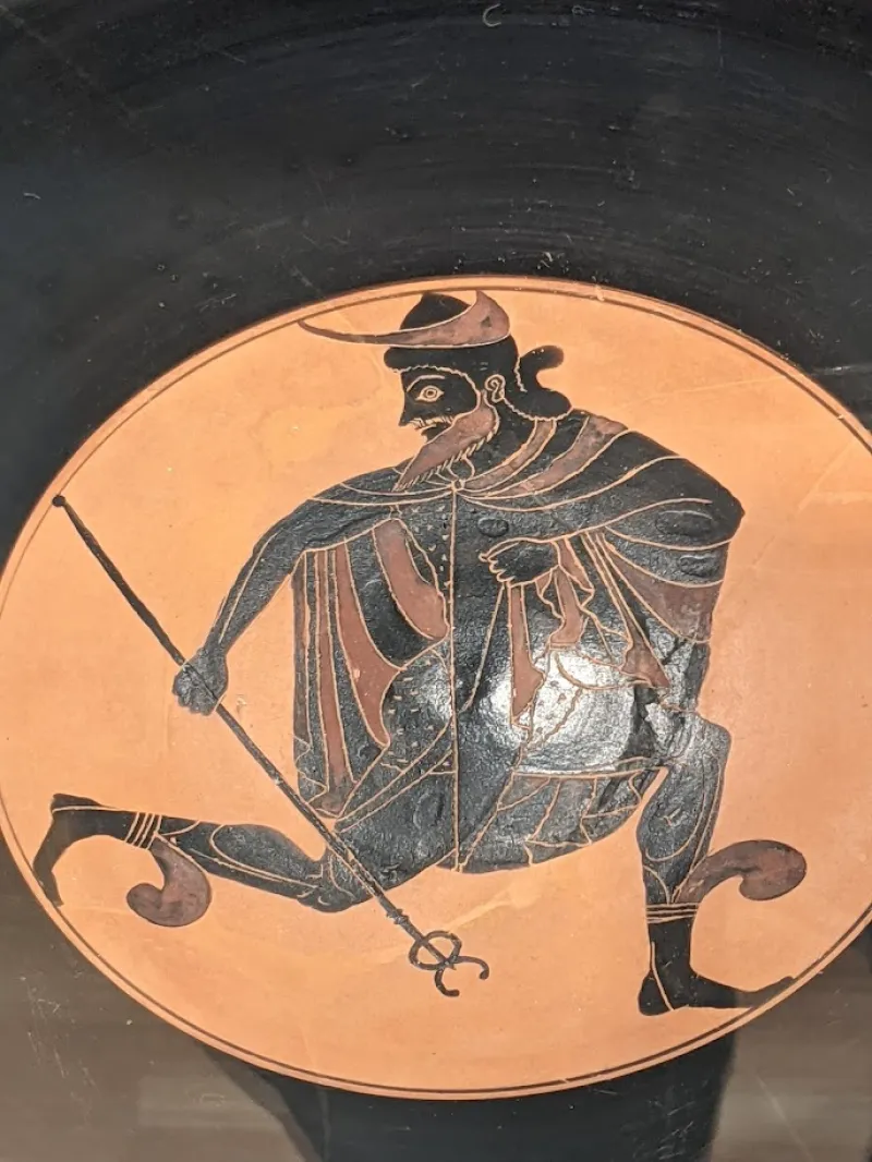 Tondo From An Attic Black-Figure Kylix Attributed To Oltos, Dating 530 Bce, Depicting The God Hermes, Eskenazi Museum Of 