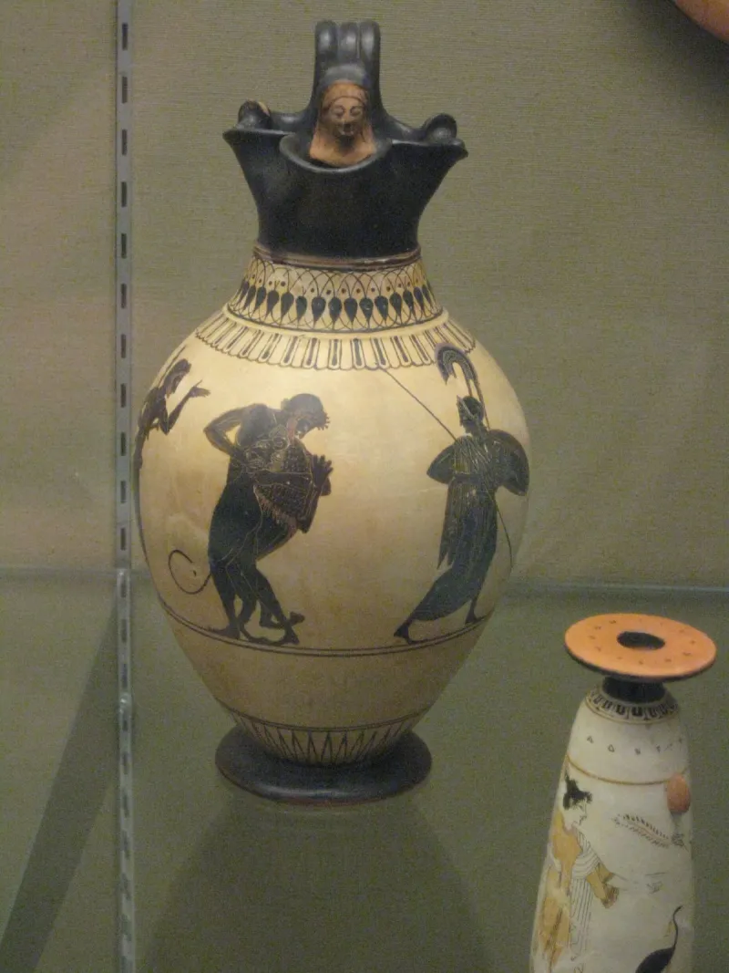 White-Ground Oinochoe With Herakles And The Nemean Lion, And 